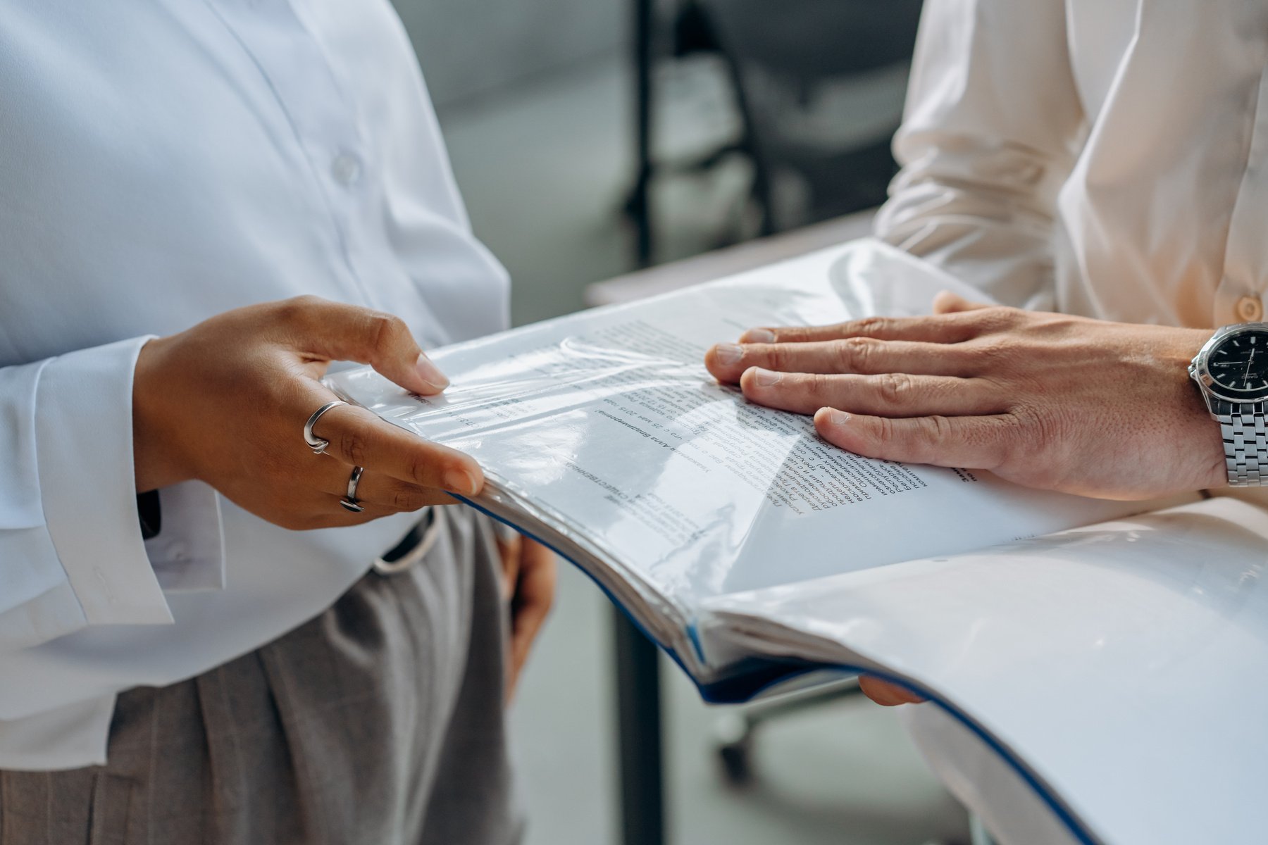 Business People Discussing About Documents